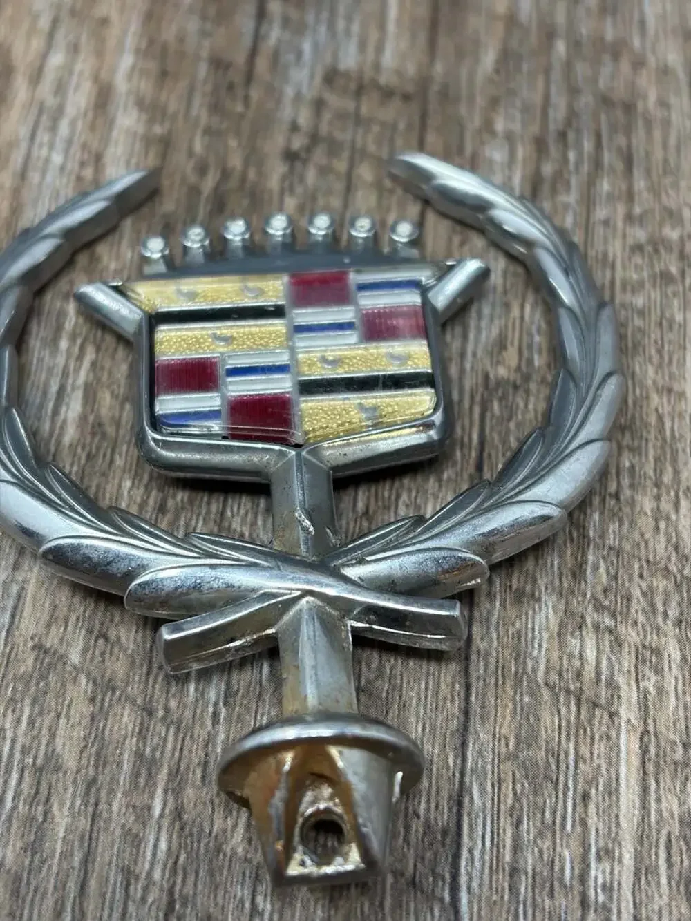 Vintage Iconic GM Cadillac crest and wreath hood ornament emblem with gold birds